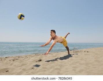 Male Beach Volleyball Game Player Jump On Hot Sand