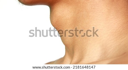 male with big adam's apple in a white background.