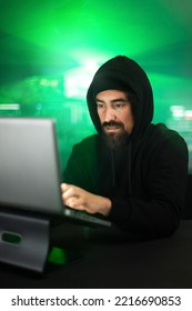 Male Black Hat Hacker Hacking Security Firewall Late In The Office.Vertical Image.