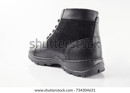 Male black leather elegant boot on white background, isolated product.