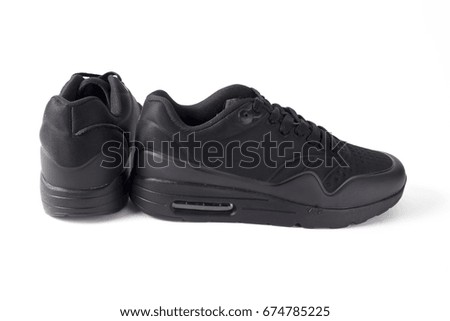 Male Black Sneaker on White Background, Isolated Product, Top View, Studio.
