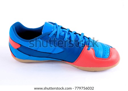 Male blue and red leather sneaker on white background, isolated product, comfortable footwear.