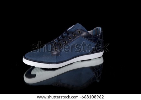 Male Blue Shoe on Black Background, Isolated Product, Top View, Studio.