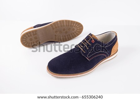 Male Blue Shoe on White Background, Isolated Product, Top View, Studio.