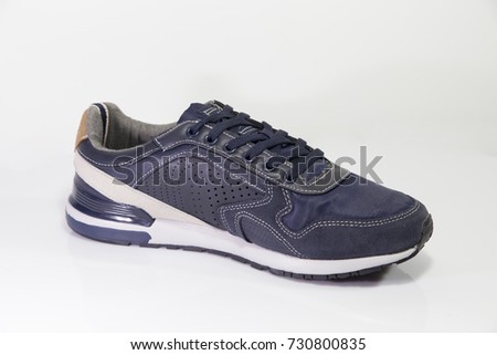 Male Blue Sneaker on White Background, Isolated Product.