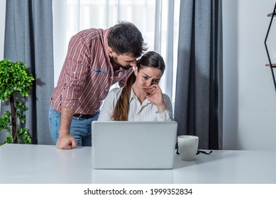 Male Boss Making Woman Worker Stressed In The Company Office On Her Probation Work Period To See How She Will Handle With Stress On Her Job, Sexual Harassment Concept 