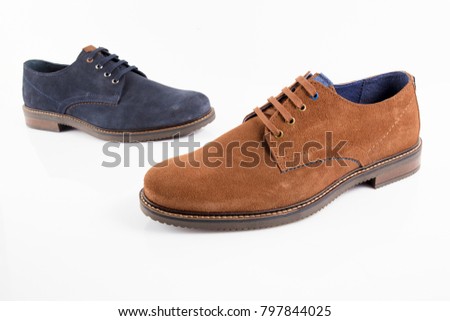 Male brown and blue shoes on white background, isolated product, comfortable Footwear.
