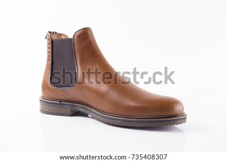 Male brown leather elegant boot on white background, isolated product.
