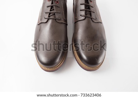 Male brown leather elegant shoe on white background, isolated product.