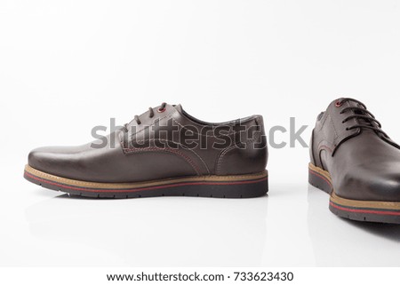 Male brown leather elegant shoe on white background, isolated product.