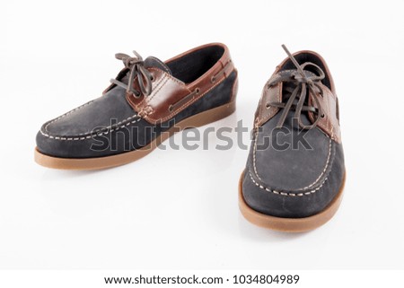 Male brown and brown leather shoe on white background, isolated product, comfortable footwear.