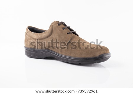 Male brown leather shoe on white background, isolated product. 