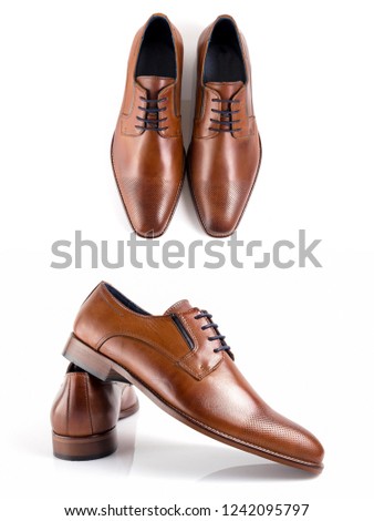 Male brown leather shoes on white background, isolated product, comfortable footwear.