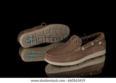 Male Brown Shoes on Black Background, Isolated Product, Top View, Studio.