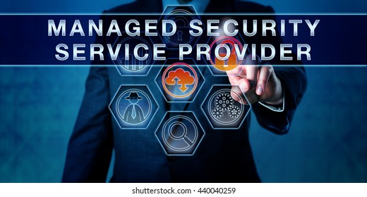 Male Business Manager Is Pushing MANAGED SECURITY SERVICE PROVIDER On An Interactive Control Screen. Business Metaphor And Internet Security Concept For Outsourced Network Security Management.