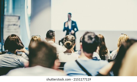 Male Business Speaker Giving A Talk At Business Conference Event.