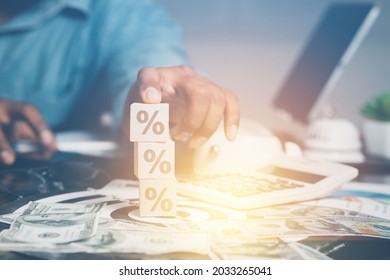 Male Businessman Analyzes The Percentage Rate Of Increase And Decrease In Tax Breaks For Investment In Financial Business.
