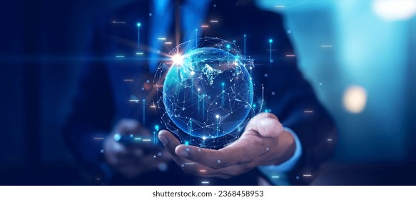 Male businessman holds abstract world with rapid growth of digital and economic technology. business contact concept Global Internet network communication connection. Internet of Things IOT. - Powered by Shutterstock