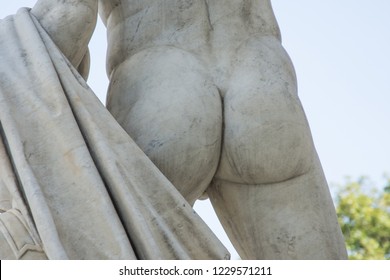 Male Buttocks Sculpture Stone Monument Close Up.