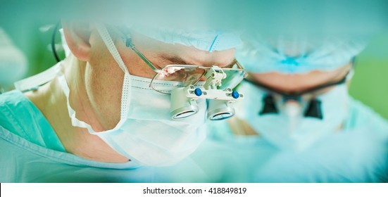 Male Cardiac Surgeon At Child Cardiosurgery Operating Room