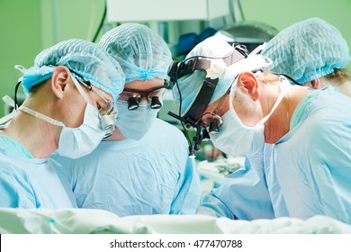 Male Cardiac Surgeon At Child Cardiosurgery Operating Room