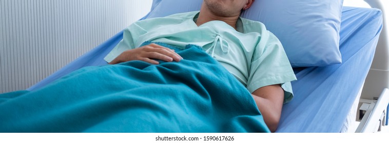 Male caucasian sick patient resting in hospital bed for medical treatment. Caucasian patient has health problem & admitted to hospital with healthcare insurance. Healthcare insurance & P.A. concept.  - Shutterstock ID 1590617626