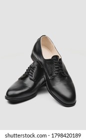 Male Classic Shoes. Derby. Men's Fashion Leather Shoes Isolated On Grey Background