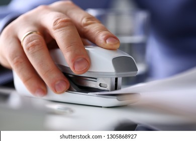 Male Clerk Arm Pin Together Some Papers With Stapler Closeup. Handy Payroll Fastener Bookkeeper Sheet Organization Concept