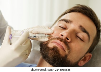 Male Client During Filler Injections In Aesthetic Medical Clinic