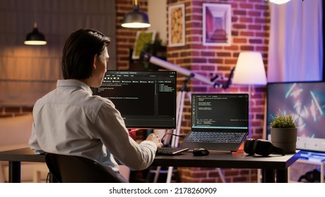 Male Coder Programming Server Encryption On Firewall Software, Using Security Network To Code System Data For Development. Working With Text Information To Script Program. .