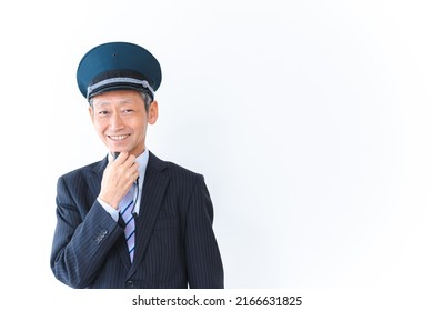 Male Conductor Making An Announcement Inside The Train