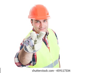 Male constructor or builder making watching you hand gesture isolated on white background with copy space area