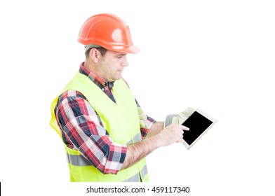 Male Constructor Pointing Finger On Tablet Or Showing Something Isolated On White Background