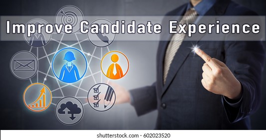 Male Consultant In Blue Shirt And Business Suit Is Recommending To Improve Candidate Experience. Human Resources Management Metaphor And Business Concept For Offering A Great Recruitment Experience.