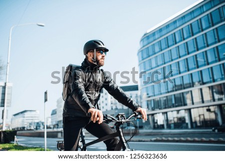 Similar – Image, Stock Photo Man with helmet riding custom motorbike