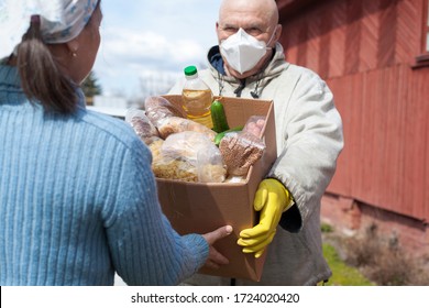  Male Courier Delivering   Dry Food Package During   Quarantine Period