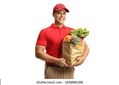 Male courier with a delivery bag of groceries smiling at camera isolated on white background - Powered by Shutterstock