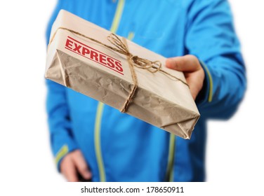 Male courier service worker or postman holding express delivery package