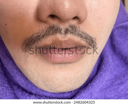Similar – Image, Stock Photo Anonymous tattoo artist applying transfer paper on client’s back
