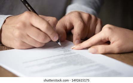 Male Customer Write Signature On Contract Meeting Lawyer Solicitor, Businessman Client Buyer Ready To Sign Employment Insurance Sale Purchase Employment Agreement Concept Make Deal, Close Up View