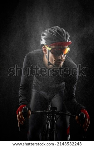 Similar – Man on bicycle preparing for triathlon race