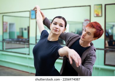 Male Dance Tutor Helps Ballerina To Learn New Moves And Perform Them Correctly. Dance Teacher, Learning Choreography