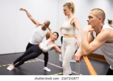 Male Dancer Oversees Professional Ballerina In The Dance Hall. High Quality Photo