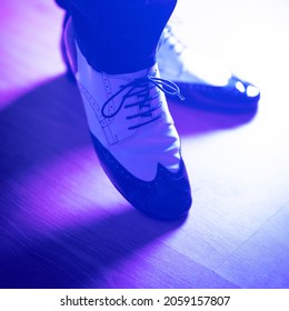 Male Dancer Teacher Dancing In Nightclub Ballroom In Jazz Dance Shoes.