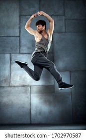 Male Dancer Training In Studio.