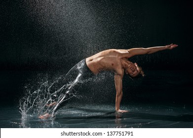 Male dancer under rain