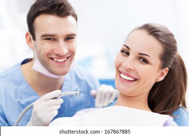 Male Dentist And Woman In DentistÃ¢Â?Â?s Office