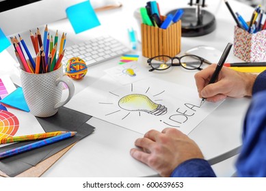 Male Designer Working In Office