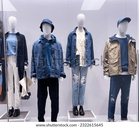Male display four mannequin wearing casual clothes 