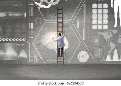 Male Doctor Climbing Ladder In Medical Concept